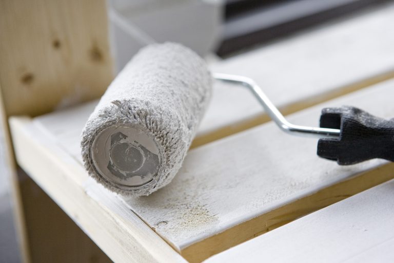 Paint roller to symbolize home maintenance.