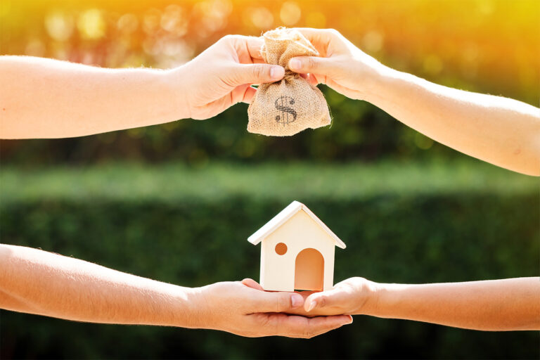 People exchanging house for money, metaphor for home prices