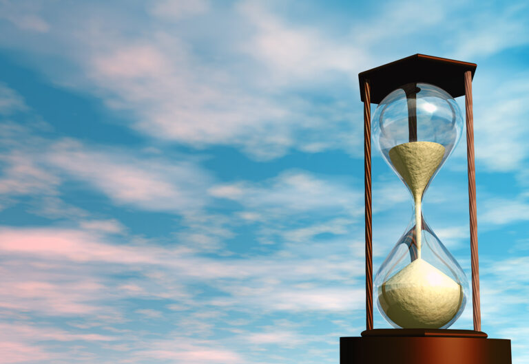 Hourglass in the sky, representing waiting in a competitive real estate market