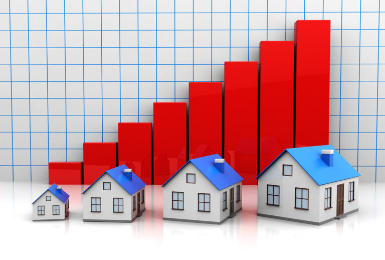 Chart and houses for real estate market update.