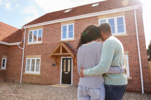 Home buyers looking at new home - real estate myths concept