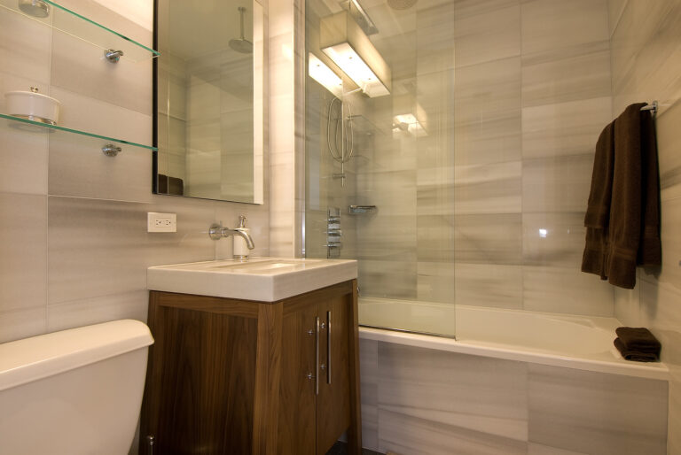 Clean updated bathroom, representing home improvement tips to add value to home.