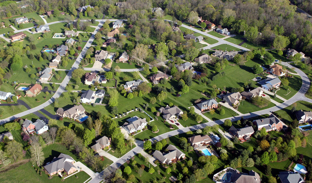 Arial view of neighborhood, representing homeowner migration trends in the United States