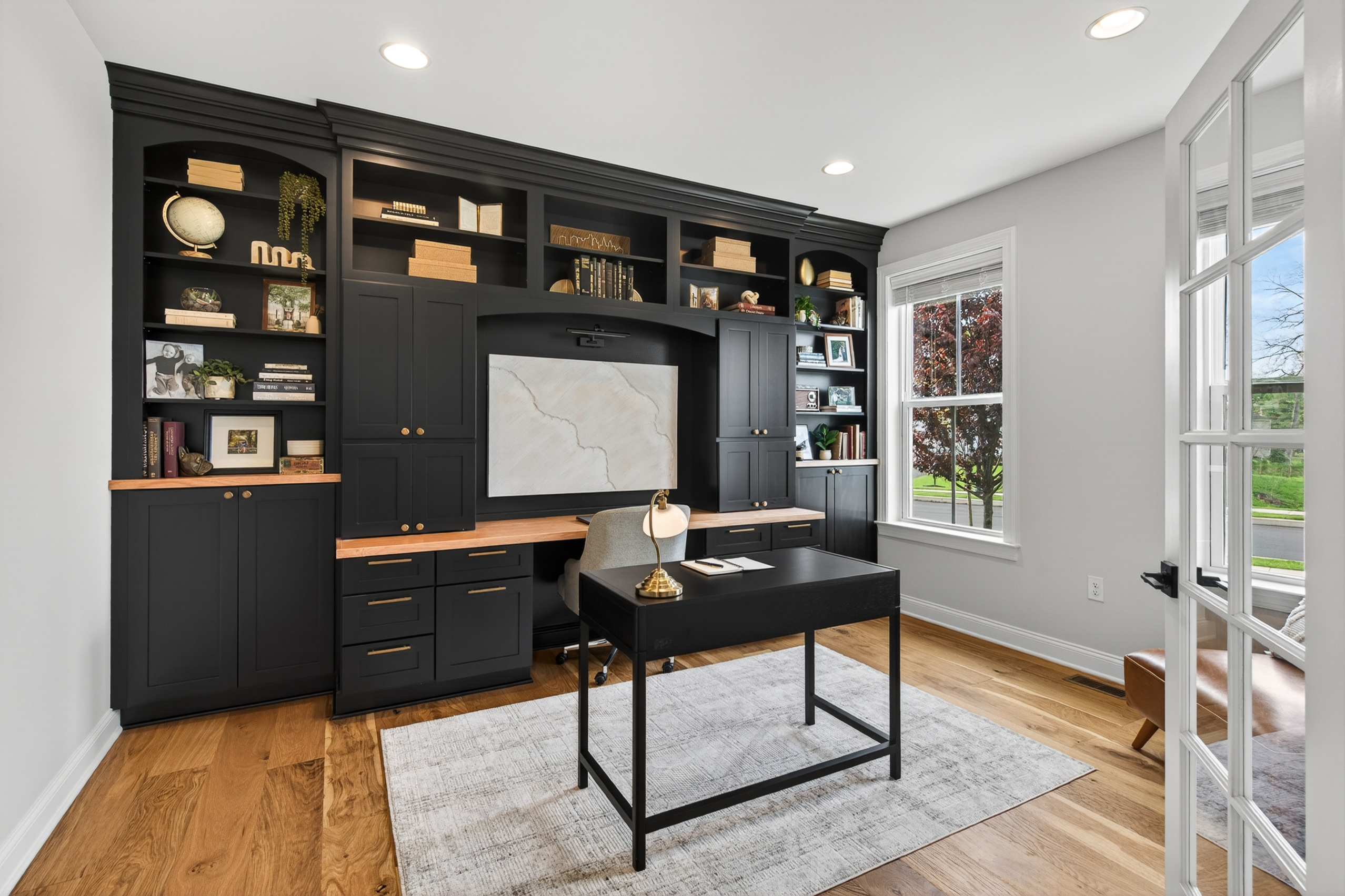 Home office enclosed by 10-lite glass French doors at 2560 Holly Lane