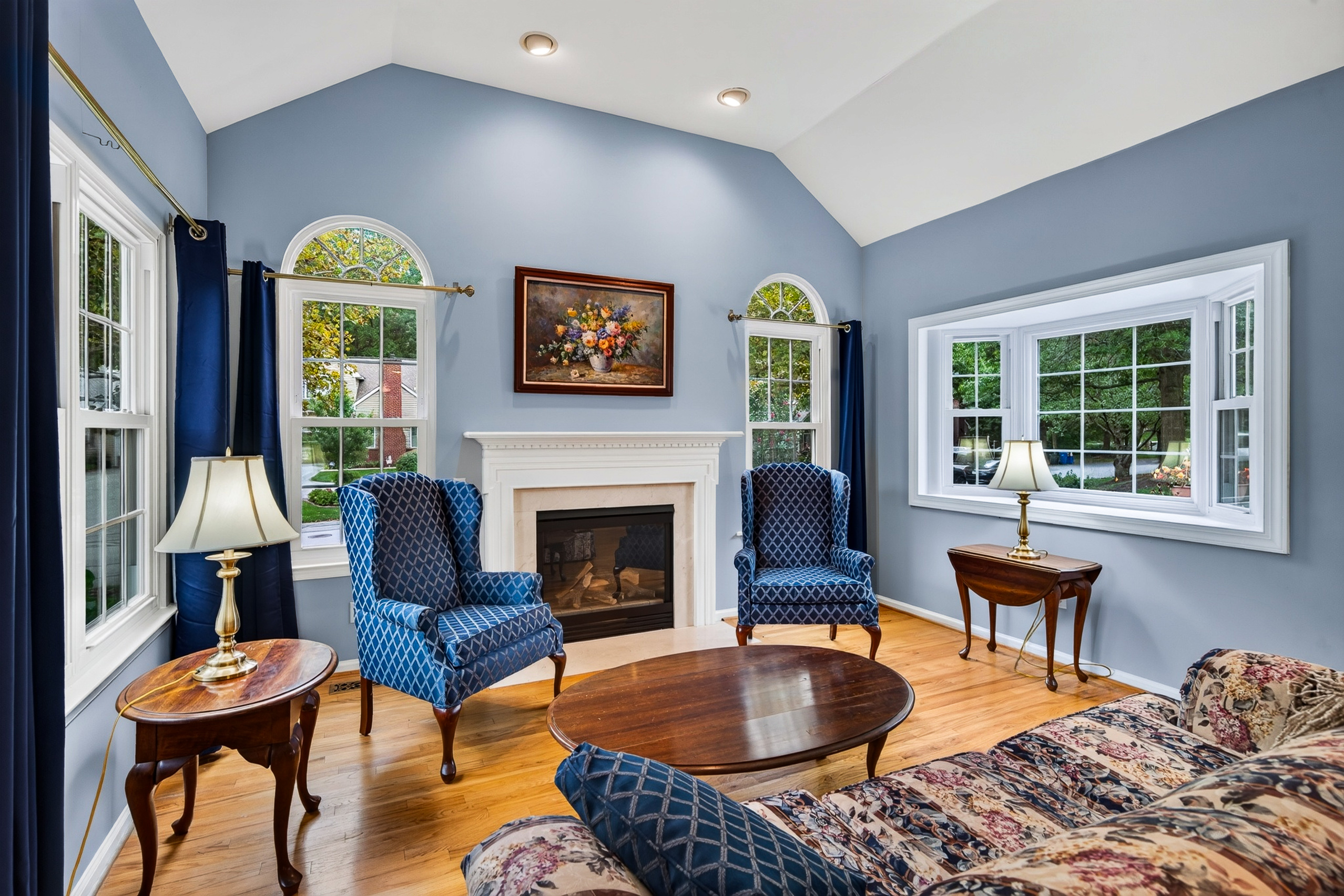 Living room with gas fireplace and cathedral ceiling at 3504 Century Ln