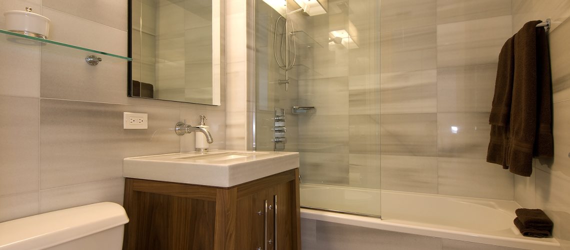 Clean updated bathroom, representing home improvement tips to add value to home.